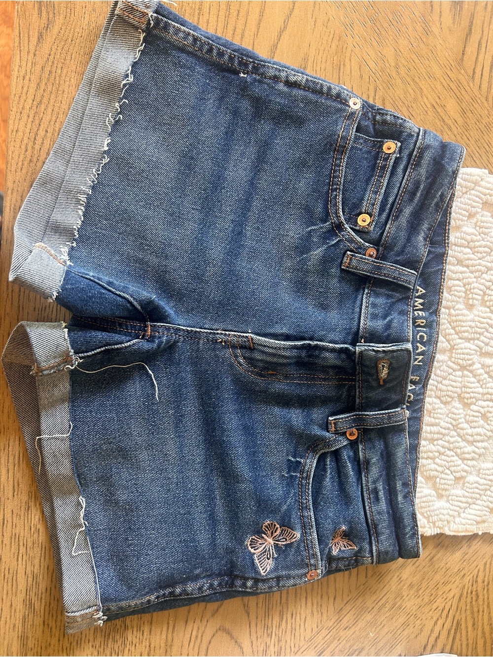 American Eagle Outfitters Blue Denim Shorts with Butterfly Embroidery (size 0)